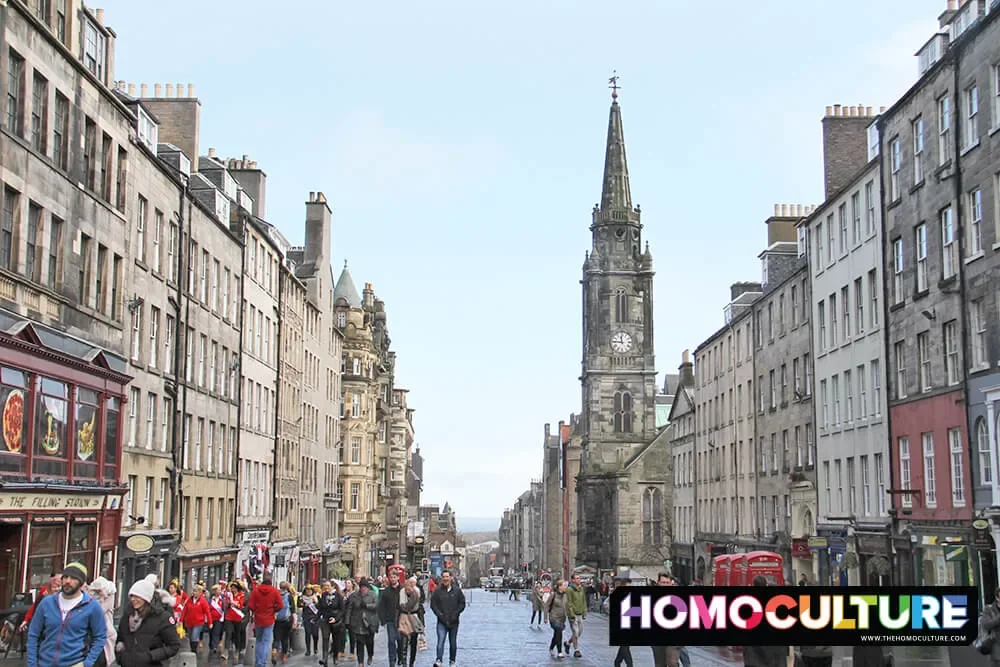 The Royal Mile in Edinburgh is filled with people walking up to Edinburgh Castle. 