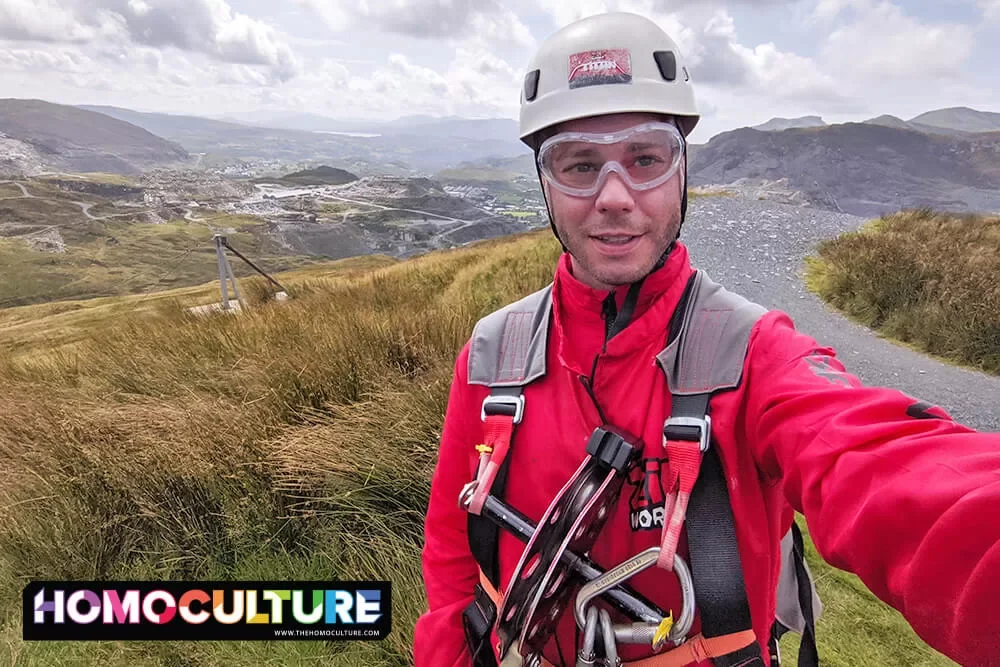 A gay man going ziplining at Zip World Titan in northern Wales. 