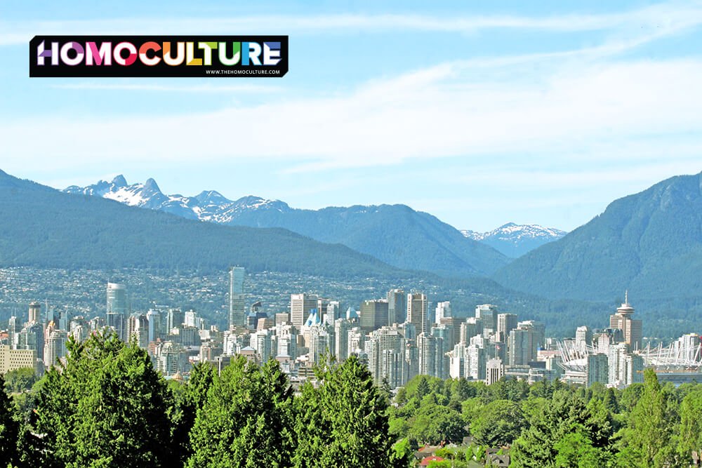 A scenic view of downtown Vancouver on a summer day, with the Northshore mountains in the background.