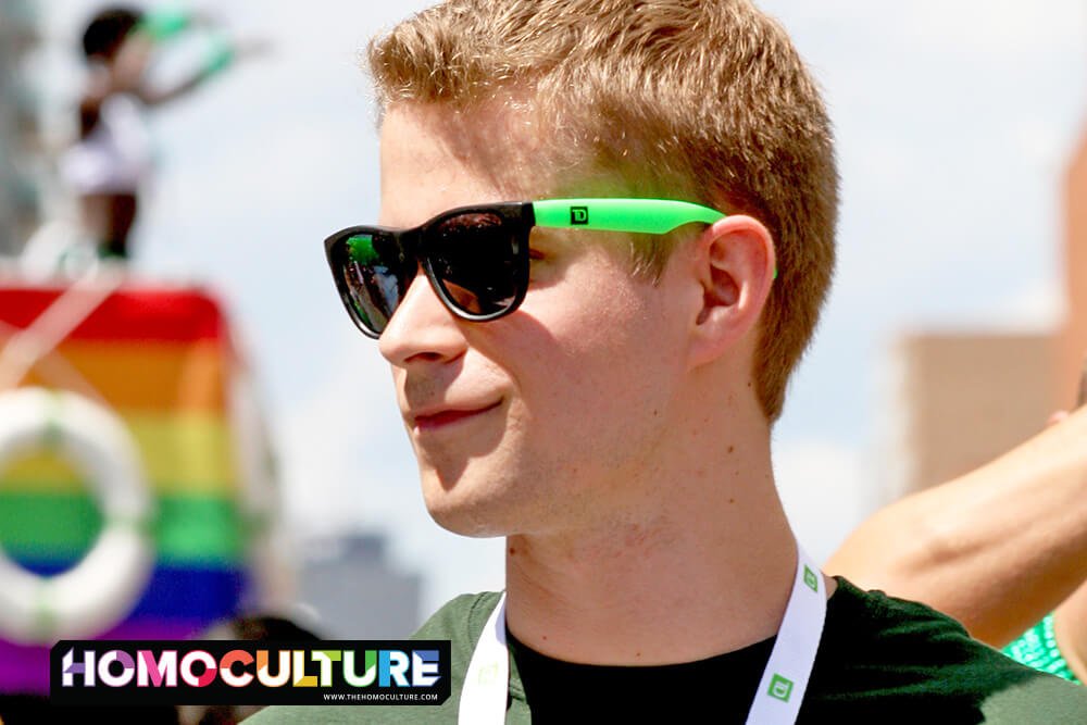 A young gay man at his first Pride parade.