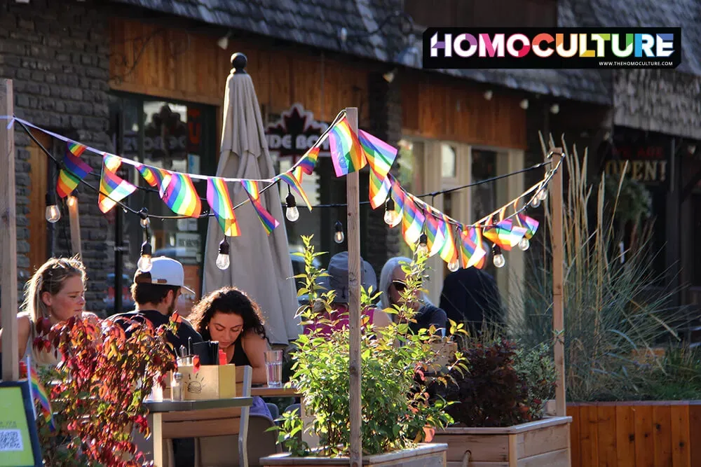 A local Banff restaurant patio with Pride flags during Banff Pride 2022.