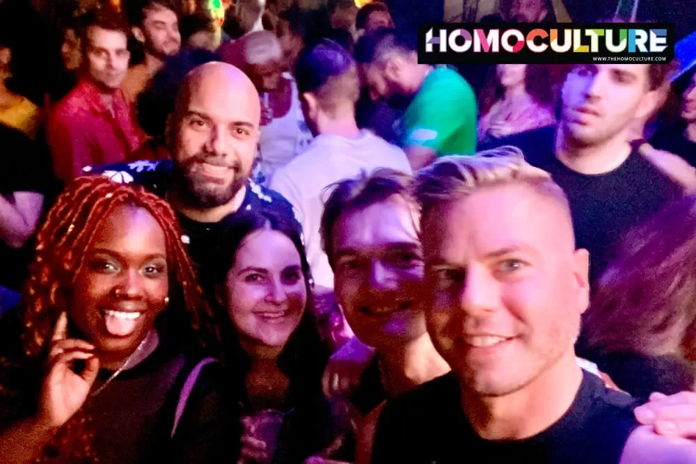 A group of friends on the dance floor at Nathan's Video Bar in Miami Beach, Florida. 