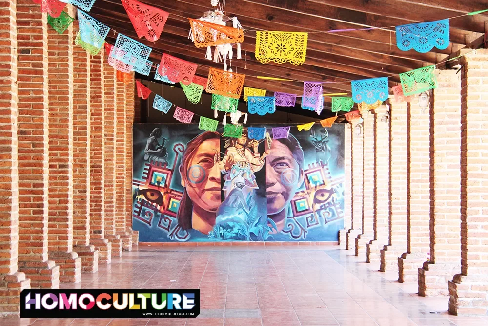 A colorful mural painted on a wall in a covered plaza in San Francisco, Mexico. 