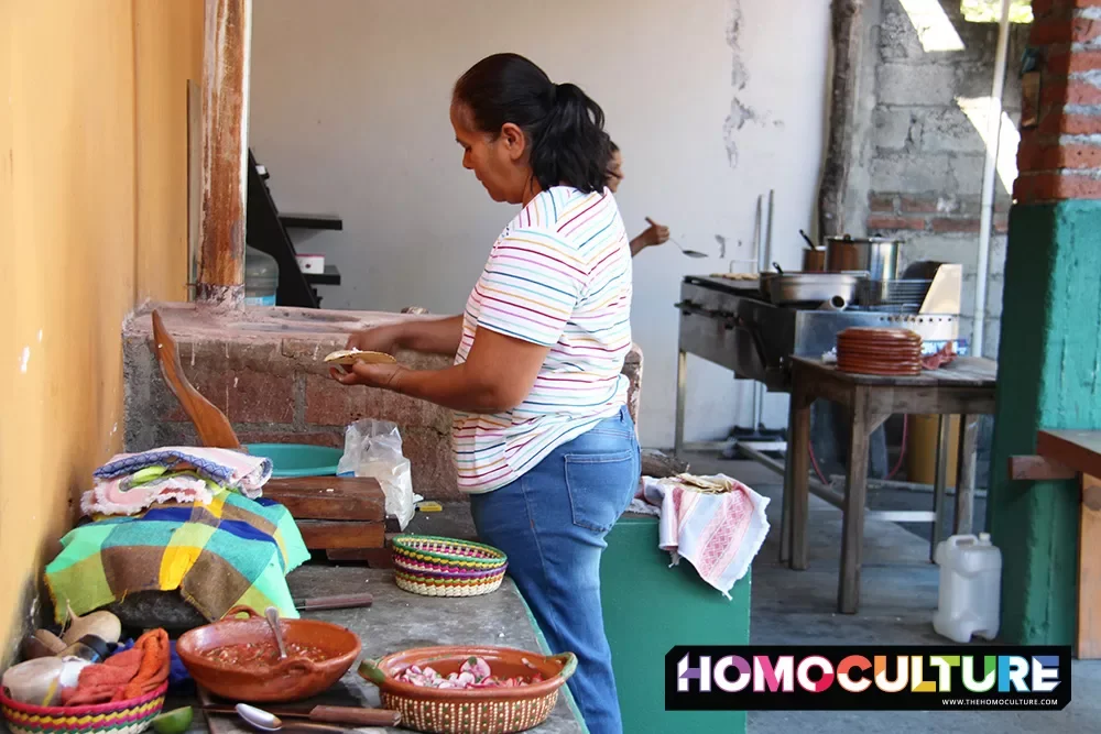 A woman makes homemade tortillas at Rincon Campesino, a family owned, locally sourced, outdoor restaurant in Coapan, Mexico. 