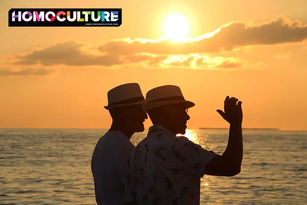 A gay couple enjoying the Key West sunset during Key West Pride 2023.