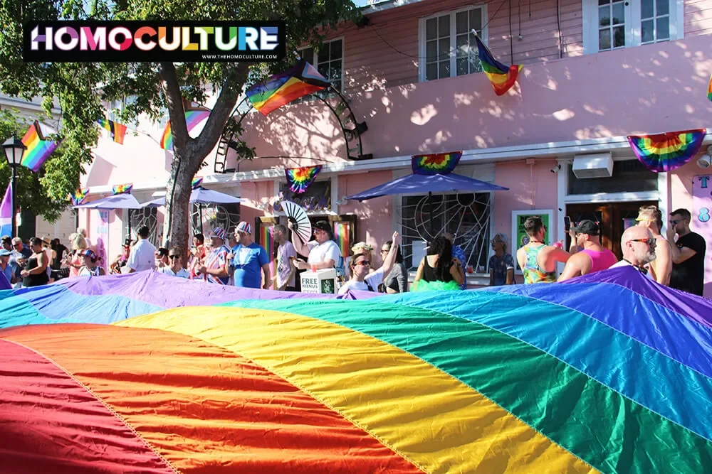 A giant Pride flag being carried down Duval Street in Key West, Florida during the 2023 Key West Pride Parade.