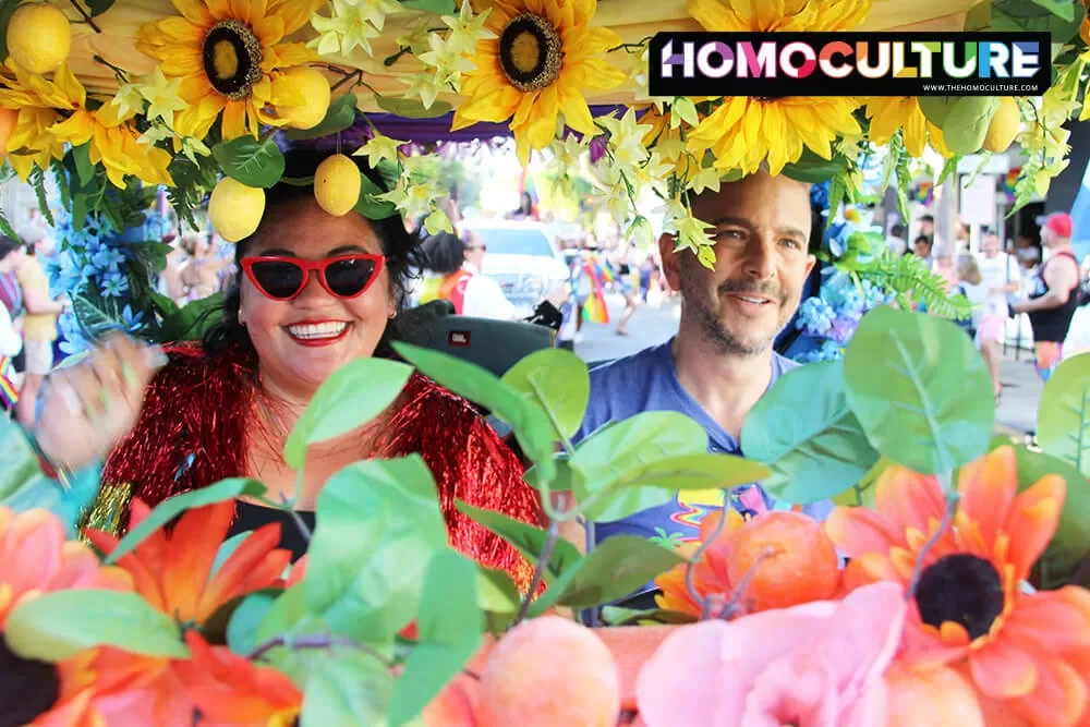 A float decorated in colorful flowers in the 2023 Key West Pride parade. 
