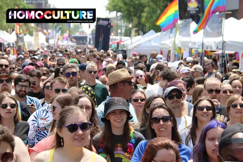 A crowd gathers to watch a live performance on the main stage at Chicago Pride Fest 2023.