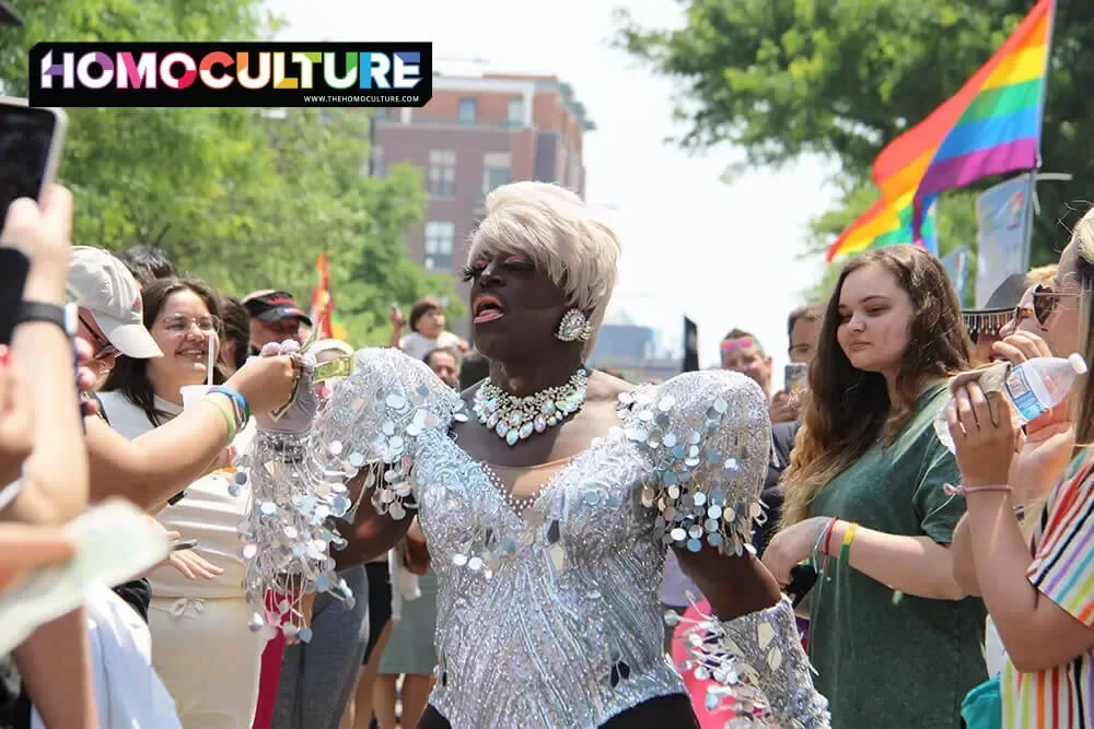 A drag performer walking through the crowd at Chicago Pride Fest 2023.