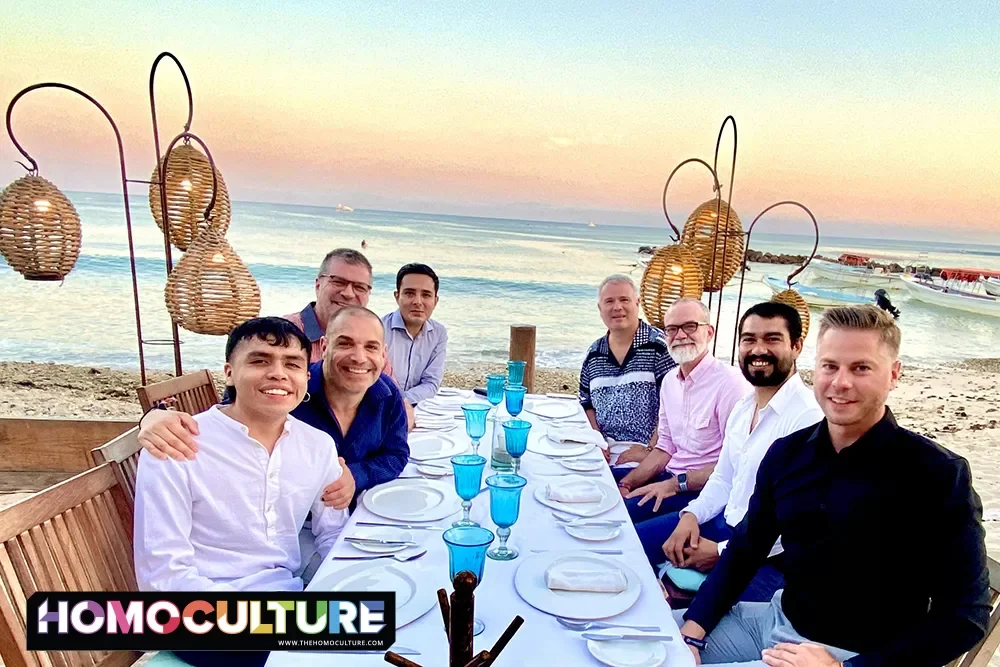 A group of friends enjoying an oceanside dinner at Tuna Blanca in Punta de Mita, Mexico. 
