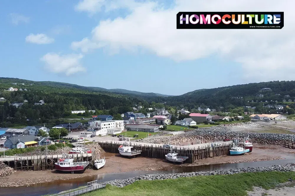 Fishing boats sitting on the ocean floor while the tide is out in Alma, New Brunswick. 