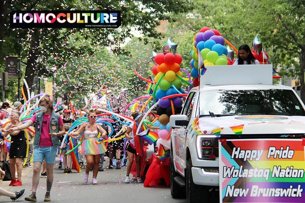 A large parade contingent makes its way through the 2023 Fredericton Pride parade. 