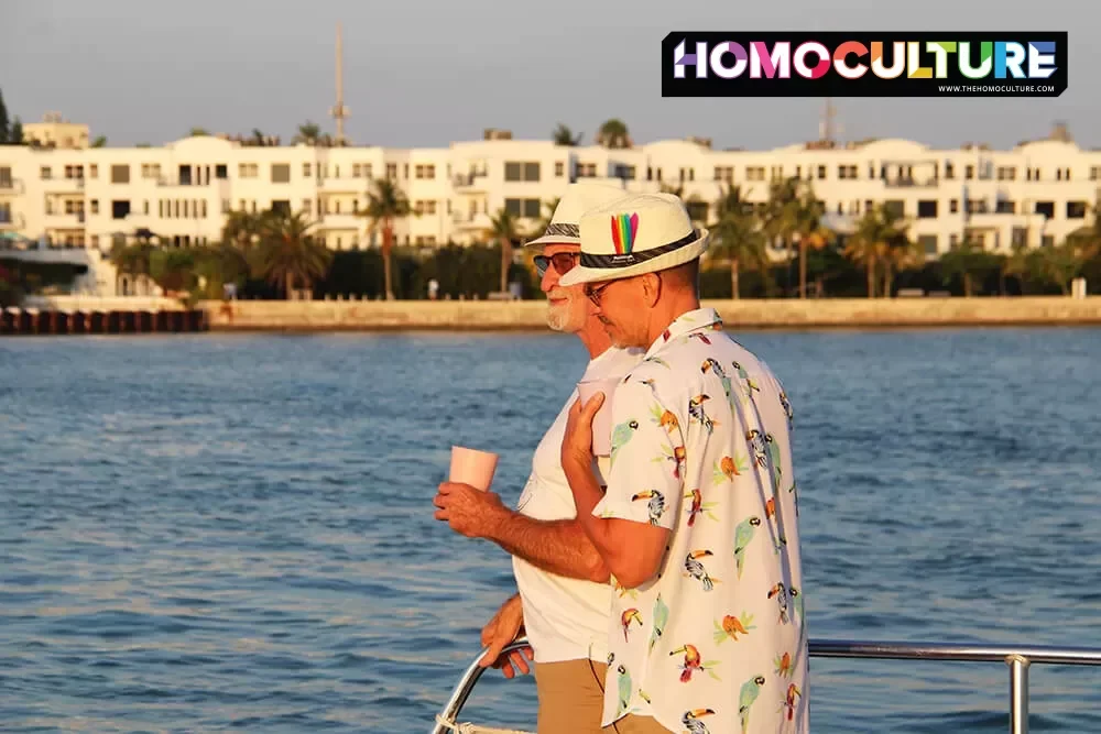 A gay couple aboard the Blue Q gay boat cruise in Key West, Florida.