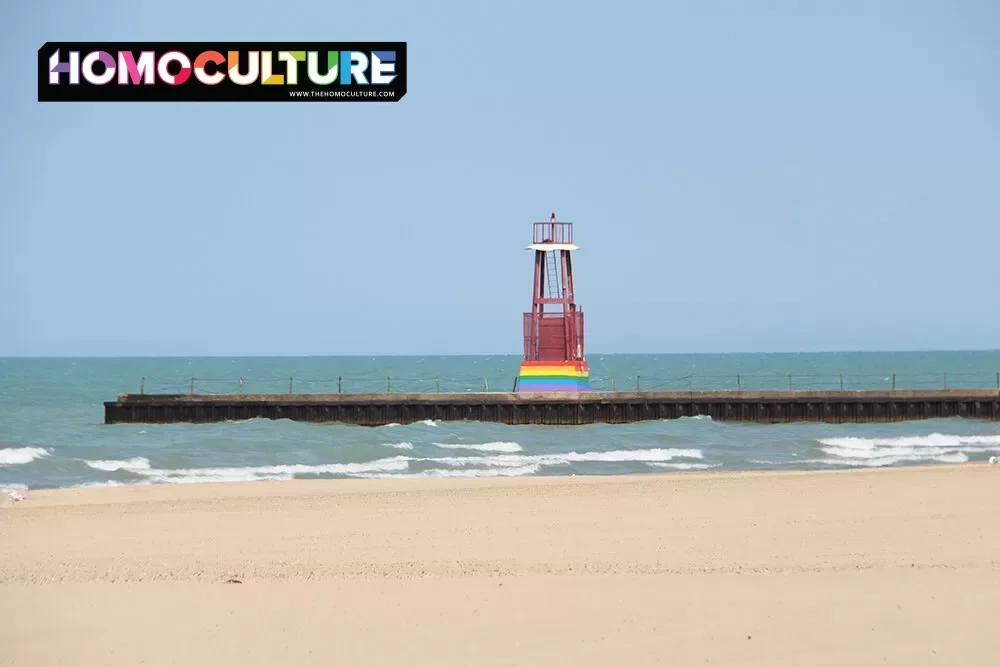 Hollywood Beach Pierced Light, at the gay beach, painted with a rainbow Pride Flag in Chicago, Illinois.