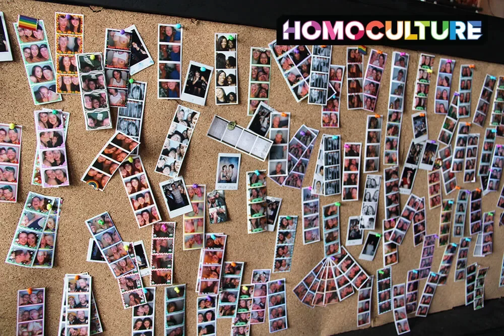 Photo Booth photo strips on a cork board inside Blue and Blu lesbian bar in Denver, Colorado. 