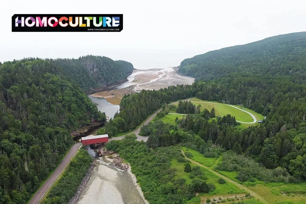 An aerial view of Pointe Wolfe Covered Bridge in Fundy National Park near Alma, New Brunswick. 