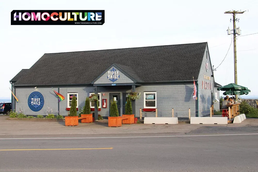 A Pride flag flies outside of Tipsy Tails restaurant in Alma, New Brunswick. 