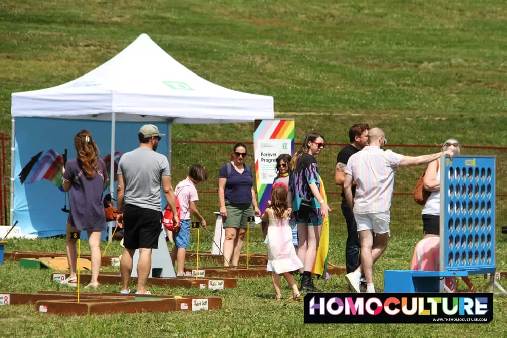 Families play large format games in the park during the 2022 Halifax Pride Festival. 