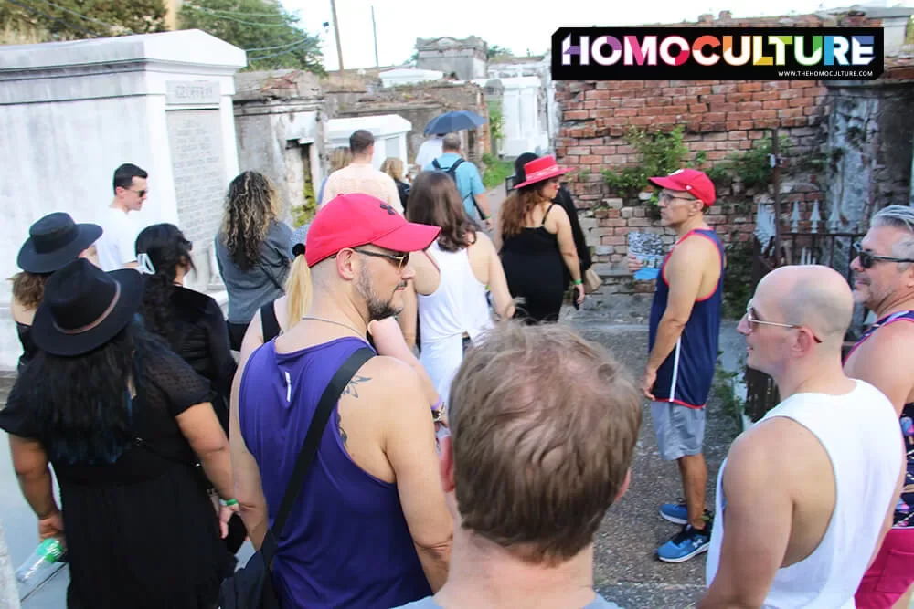 A group of gay men on a cemetery tour inside St. Louis Cemetery #1 in New Orleans. 