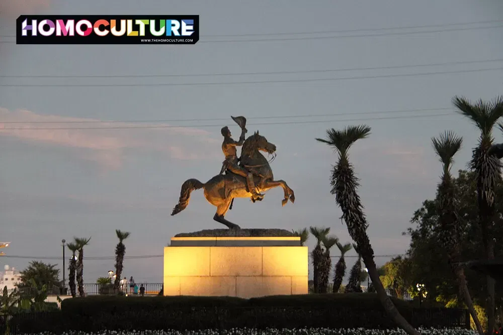 Jackson Square statue in the French Quarter of New Orleans, lit up at night. 