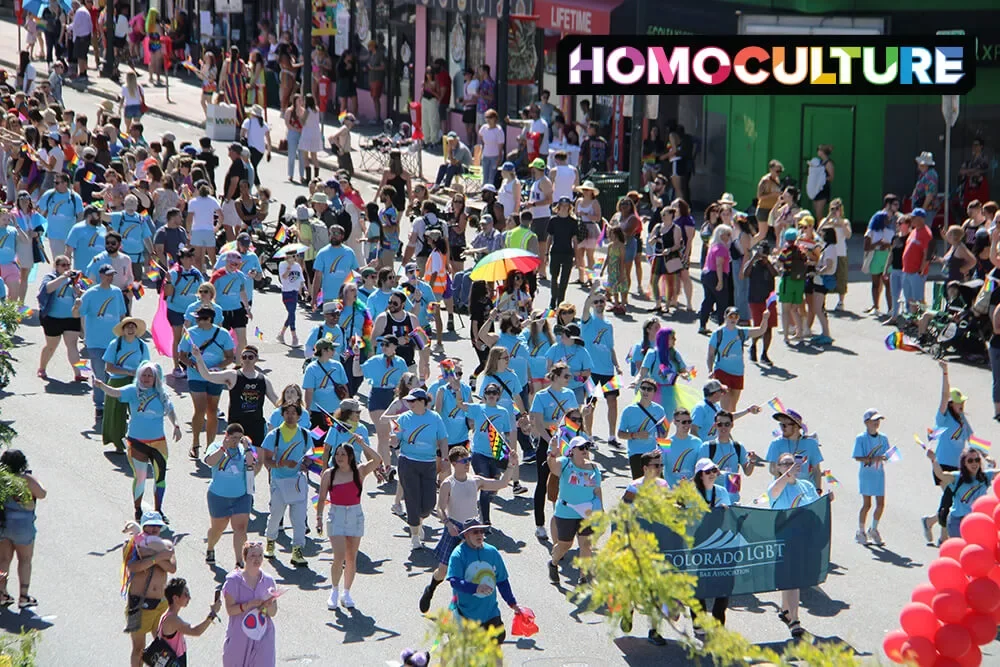 A large community group marching in the 2023 Denver Pride Parade. 