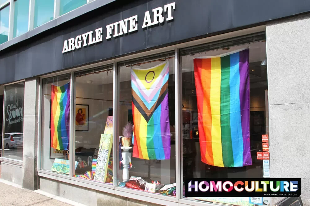 A local storefront decorated with Pride flags for Halifax Pride 2022. 