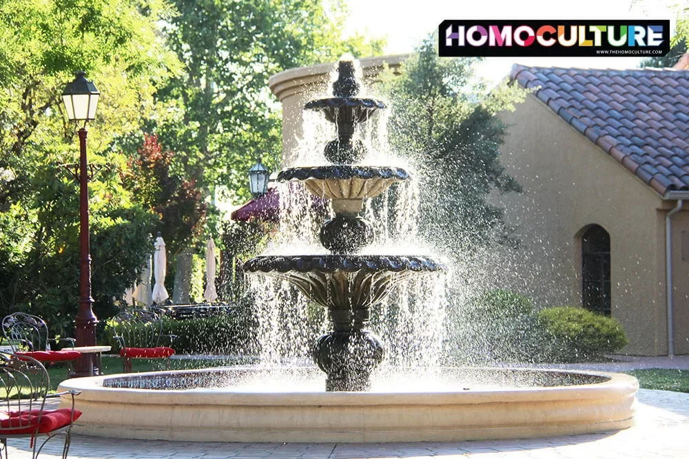 A decorative water fountain splashes in the heart of Vintners Resort. 