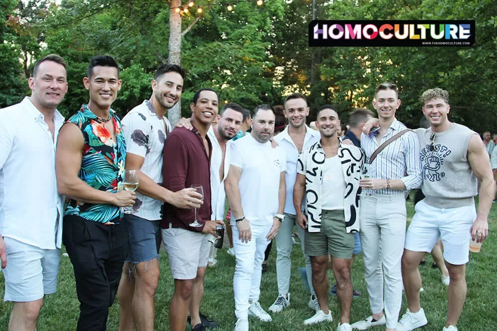 A group of gay men at the Twilight T-Dance during Gay Wine Weekend 2023. 