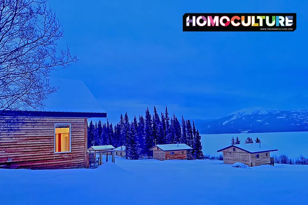 Cozy log cabins on a snowy day at Southern Lakes Resort, near Whitehorse, in the Yukon Territory.