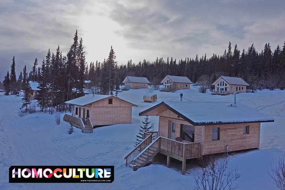 Cozy log cabins on a snowy day at Southern Lakes Resort, near Whitehorse, in the Yukon Territory.