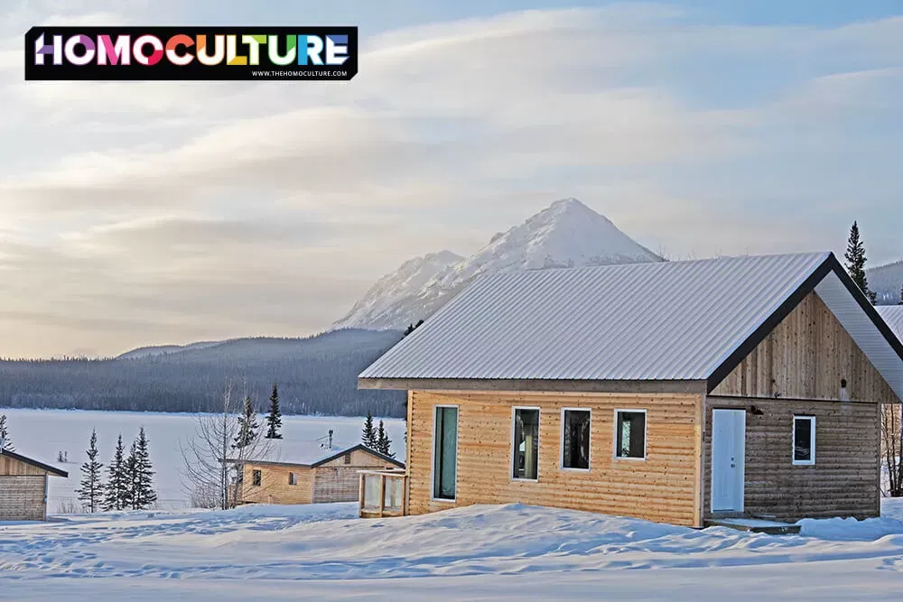 Cozy log cabins on a snowy day at Southern Lakes Resort, near Whitehorse, in the Yukon Territory.